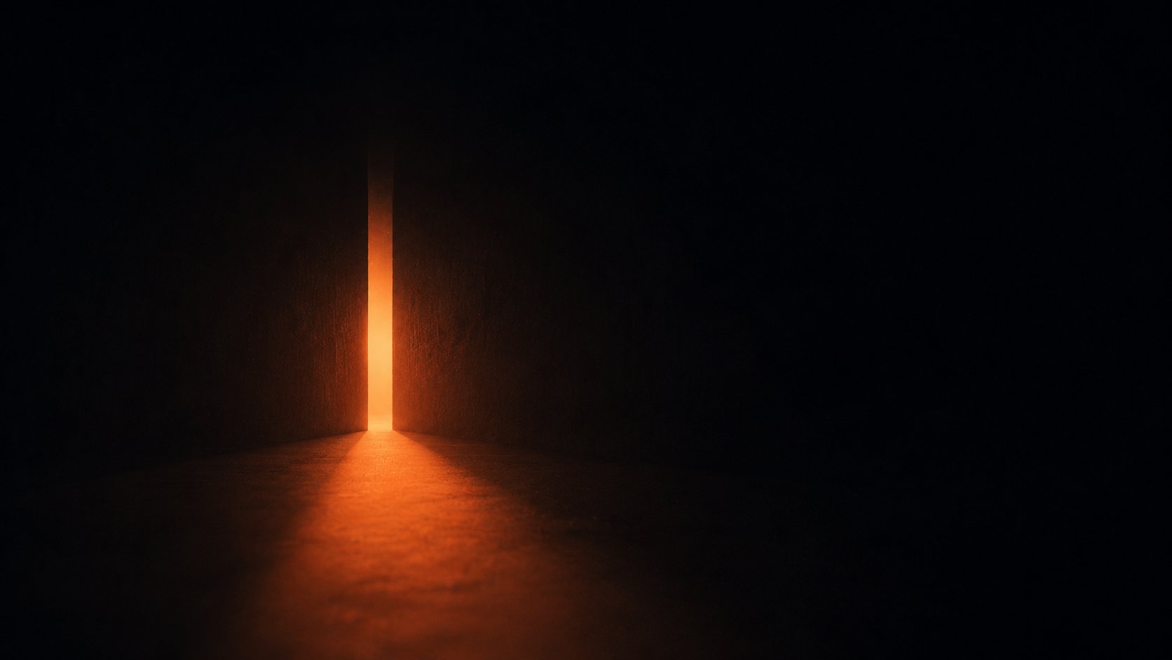 A warm aperture of light opening in a vast dark plane